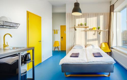 赫克托设计旅舍客房内的一张或多张床位