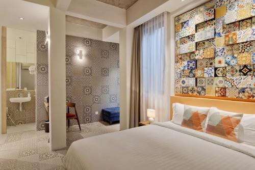 马六甲泰姆兹酒店客房内的一张或多张床位