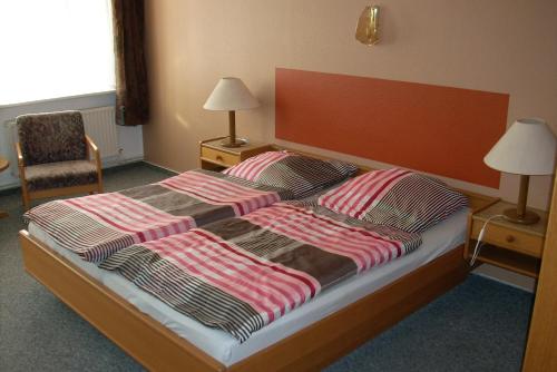 Hotel Bürgerstube客房内的一张或多张床位