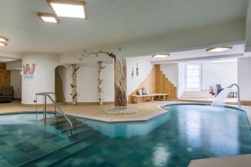 FORESTO - holiday apartments内部或周边的泳池