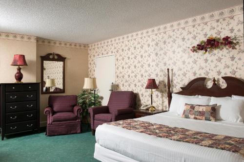 手中鸟家庭宾馆客房内的一张或多张床位