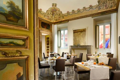 Locanda della Posta Boutique Hotel餐厅或其他用餐的地方