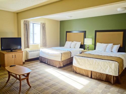 杰克逊维尔 - 勒努瓦大道南长住公寓式酒店客房内的一张或多张床位