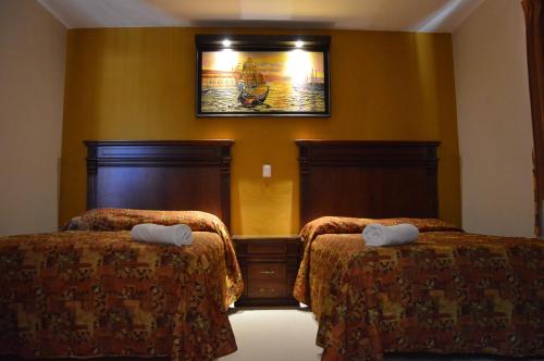 特拉克塔康纳尔鲁姆斯酒店客房内的一张或多张床位