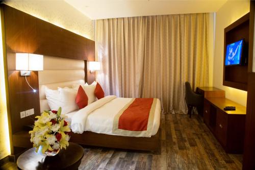 Imperium Resort客房内的一张或多张床位