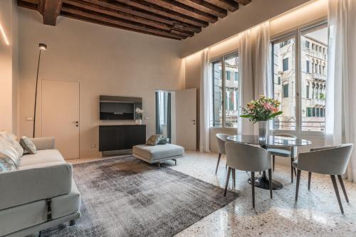 Palazzo Morosini Degli Spezieri - Apartments的休息区