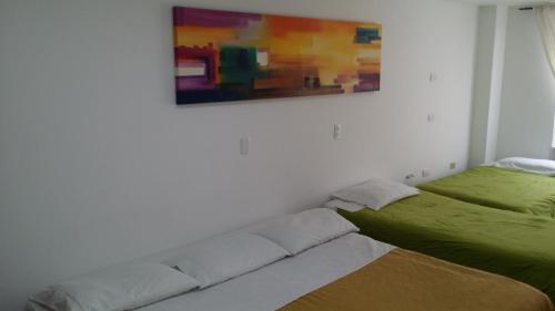 A Bogota On Holidays by Open - HOTEL客房内的一张或多张床位