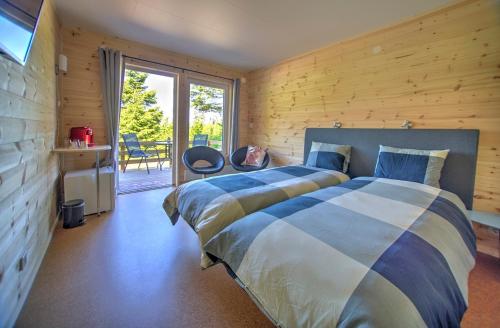 Hamgården Nature Resort Tiveden客房内的一张或多张床位