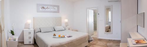 Ragusina luxury apartments客房内的一张或多张床位