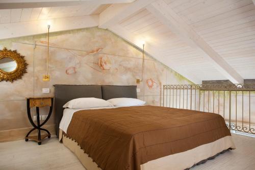 伊尔维里诺SPA酒店客房内的一张或多张床位