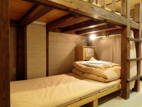 京都花纳旅馆客房内的一张或多张床位