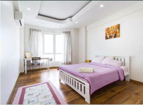 海景舒适温馨三卧室公寓客房内的一张或多张床位