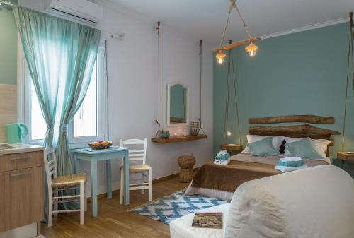 雅典木制一室公寓客房内的一张或多张床位