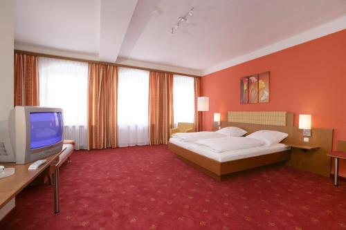 齐格勒布劳旧城区酒店客房内的一张或多张床位