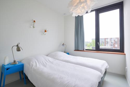 阿姆斯特丹湖景公寓客房内的一张或多张床位