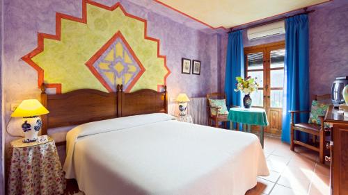 Hotel De Mecina Fondales客房内的一张或多张床位