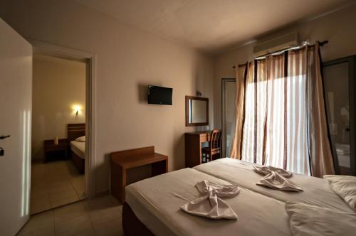 Hotel Sias Resort客房内的一张或多张床位