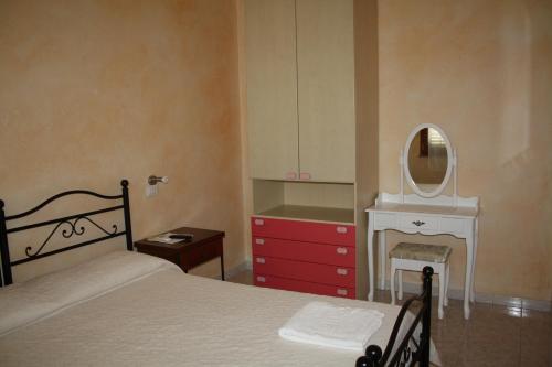 La Pavoncella客房内的一张或多张床位