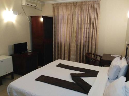 Pensao Marhaba Residencial客房内的一张或多张床位