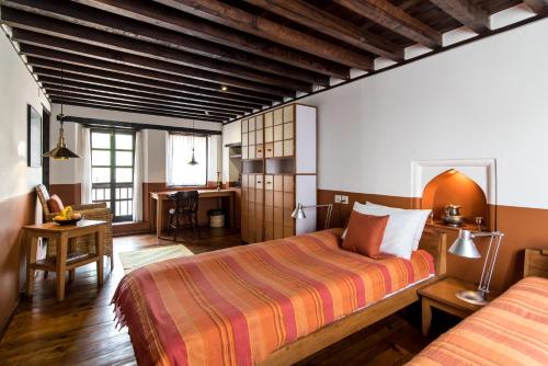 Milla Guesthouse Bhaktapur客房内的一张或多张床位