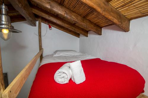 Casa Fajara客房内的一张或多张床位