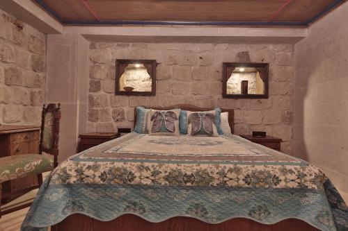 谷子德窑洞酒店客房内的一张或多张床位