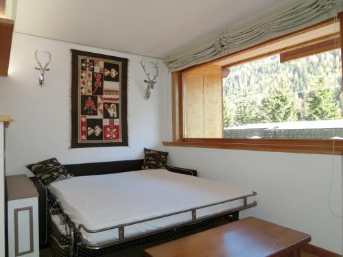 Bilocale Alberti - Gran Baita客房内的一张或多张床位
