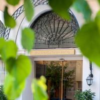 雅典阿瑞姆极可意套房酒店，位于雅典尼奥斯·科斯莫斯的酒店