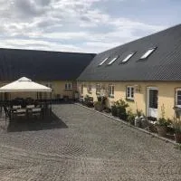 Strandsegård Ferielejlighed，位于Ølsted的酒店