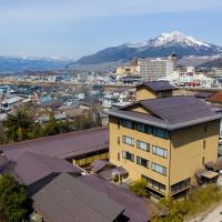 丰生日式旅馆，位于山之内町汤田中的酒店