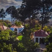 HOTEL Y RESTAURANTE HACIENDA LOS VOLCANES,位于Santa Lucía Milpas Altas的酒店