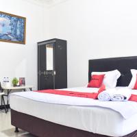 RedDoorz near Sultan Hasanuddin Airport 2，位于马卡萨苏丹哈桑丁国际机场 - UPG附近的酒店