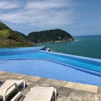 Apartamento Familiar Guaruja，位于瓜鲁雅Tortuga的酒店