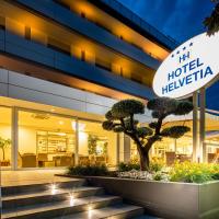 Hotel Helvetia，位于利尼亚诺萨比亚多罗Pineta的酒店