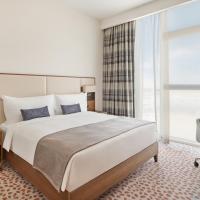 Staybridge Suites Dubai Al-Maktoum Airport by IHG，位于迪拜阿勒马克图姆国际机场 - DWC附近的酒店