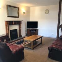 Spacious home by the sea in Scalloway.，位于Scalloway三伯格机场 - LSI附近的酒店