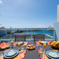 BeachFront in Puerto Mog&aacute;n，位于莫甘海滩的酒店