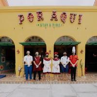 Por Aqui Stay & Dine，位于Timuran普罗维罗塔曼街的酒店