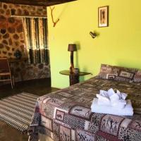 Charming Bush chalet 1 on this world renowned Eco site 40 minutes from Vic Falls Fully catered stay - 1975，位于维多利亚瀑布维多利亚瀑布国际机场 - VFA附近的酒店