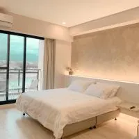 如沐咖啡旅宿,位于Xingjian的酒店