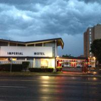 科特兰帝国汽车旅馆，位于科特兰考特兰德县大通场机场 - CTX附近的酒店