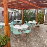 Hotel Pacífic Suites Tocopilla，位于TocopillaBarriles - TOQ附近的酒店