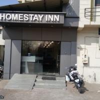 Homestayinn，位于艾哈迈达巴德萨达尔·瓦拉巴伊·帕特尔国际机场 - AMD附近的酒店