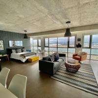 KASA Skyview Luxury Loft Style 15th floor Condo，位于圣胡安Isla Grande Airport - SIG附近的酒店
