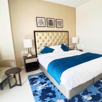Lovely one bedroom apartment with world class hotel amenities，位于迪拜Dubai World Central的酒店