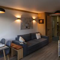 Courchevel 1550 - SUPERBE appartement SKIS AUX PIEDS !，位于谷雪维尔高雪维尔1550的酒店