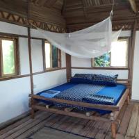 ZIONZURI ARTS ECOVILAGE TREE HOUSE，位于Mbwamaji的酒店