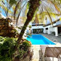 Linda Casa com Piscina no Jd. Acapulco-Guarujá，位于瓜鲁雅Jardim Acapulco的酒店