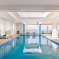 Al Hail Waves Hotel Managed By Centara，位于锡卜的酒店