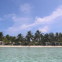 蓝姬尼斯度假酒店，位于阿鲁坦加Aitutaki Airport - AIT附近的酒店